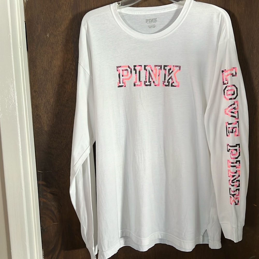 Ladies long sleeve Pink shirt. Size Large. White with pink and black lettering.